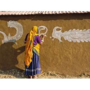  Woman Decorating Her House with Traditional Local Designs 