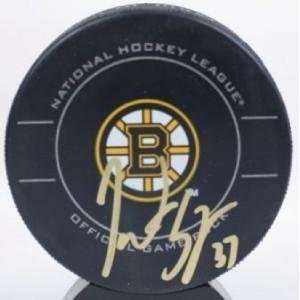  Patrice Bergeron Autographed Hockey Puck   Autographed NHL 