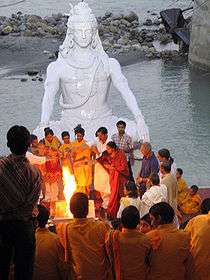 havan ceremony on the banks of Ganges , Muni Ki Reti 