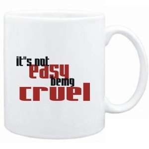   Mug White  Its not easy being cruel  Adjetives