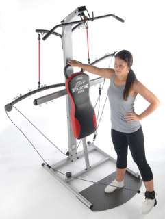   home gym with multiple upper and lower body exercises includes two