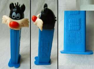 old PEZ candy dispencer Sylvester cat cartoon feet foot  