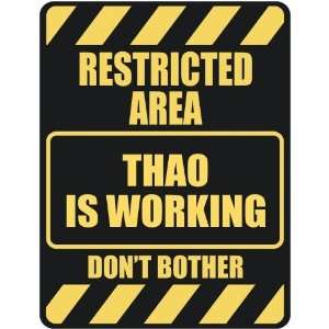   RESTRICTED AREA THAO IS WORKING  PARKING SIGN