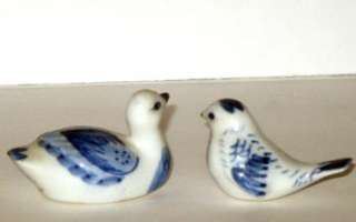   of a lot of 5 collectible porcelain and ceramic birds, including