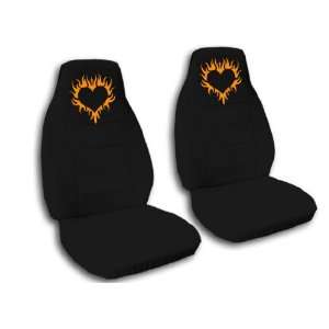  2 black seat covers with a orange burning heart for a 2001 