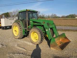 JOHN DEERE 6400 4X4 TRACTOR WITH CAB AND LOADER, RUNS GOOD  