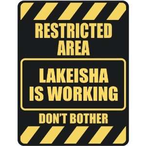   RESTRICTED AREA LAKEISHA IS WORKING  PARKING SIGN