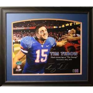    Signed Tim Tebow Picture   shaking hands 16x20 