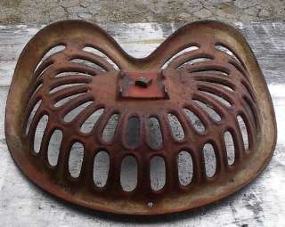 This is a Vintage cast iron tractor seat that is very rare to find 