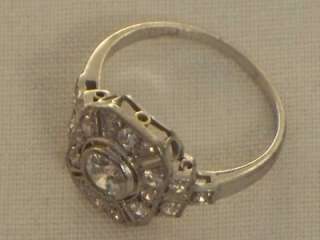 AN ANTIQUE 18CT WHITE GOLD LADIES RING INSET WITH ROUND CUT GENUINE 