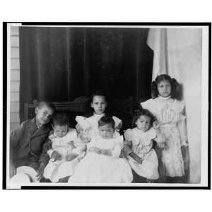  African American children posed for on a porch