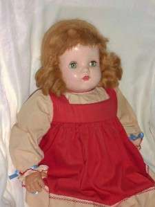 The following auction is for a Vintage Composition Baby Doll