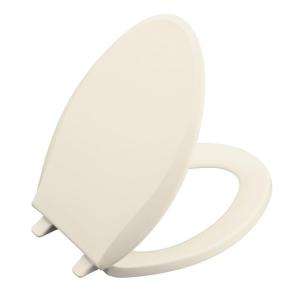   Cachet Elongated, Closed front Toilet Seat with Q2 Advantage in Almond
