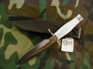 spacers black micarta handle in concave shape and black sheath call 