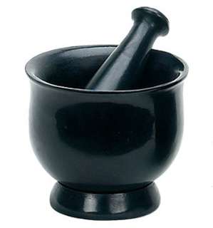 This black soapstone Mortar and Pestle resembles a cauldron, with a 