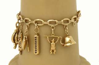 VINTAGE 14K SOLD GOLD CHARM BRACELET W/ 12 CHARMS  