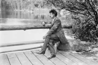 1900s photo Ernest Thompson Seton, on bench  