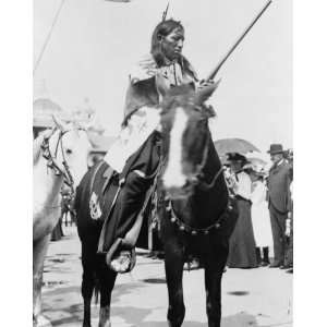  1901 photo Indian, holding gun, on horse, at the Pan 