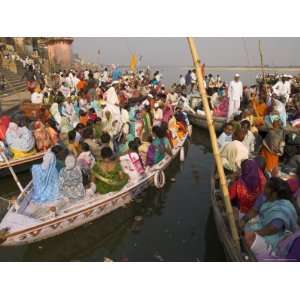 Groups of Pilgrims in Small Boats on Their Way to a Religious Ceremony 