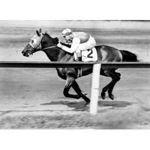  1937 Johnny Red Pollard jockeying Seabiscuit to win the 